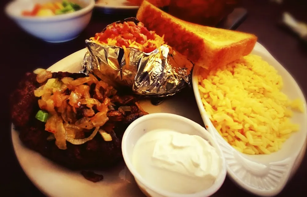 Chopped Steak with Baked Potato and Rice
